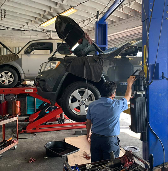 Mechanic working on car 